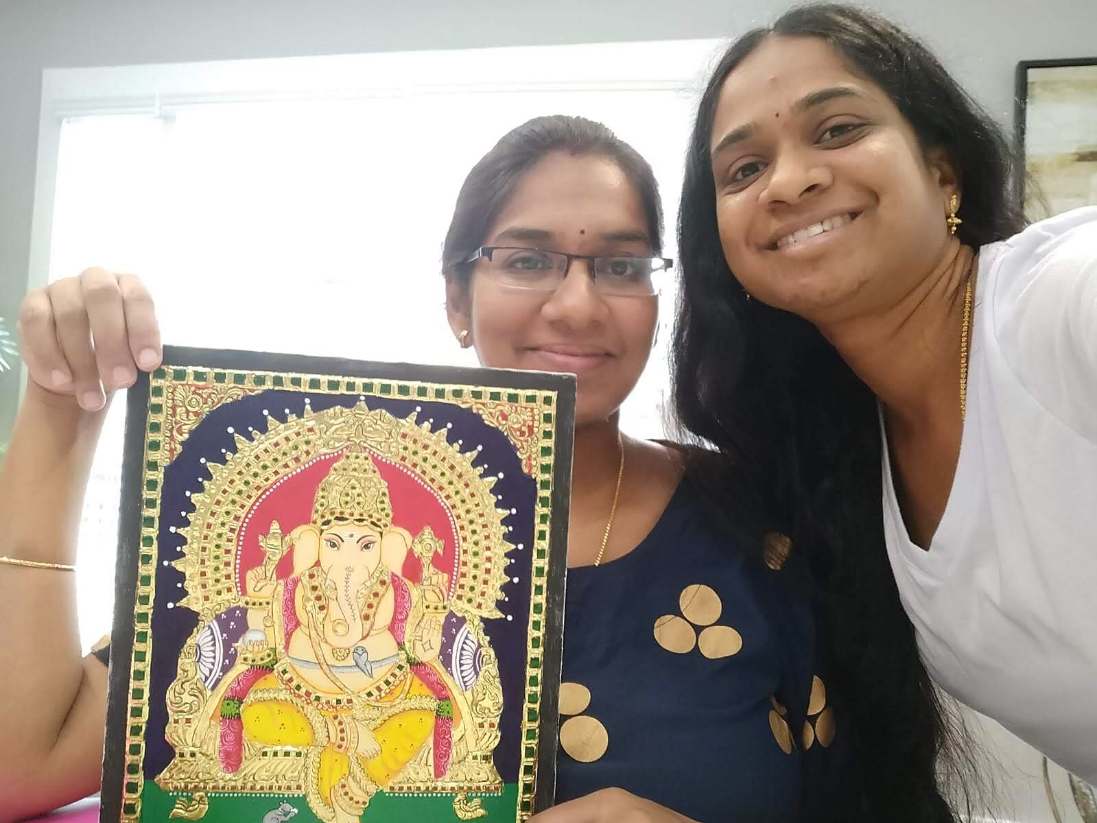 Student with a finished Ganesha piece